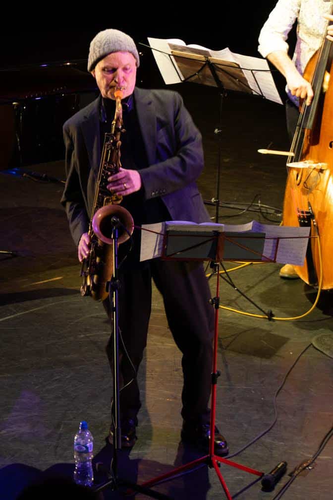 Close-up of Mornington Lockett playing saxophone.